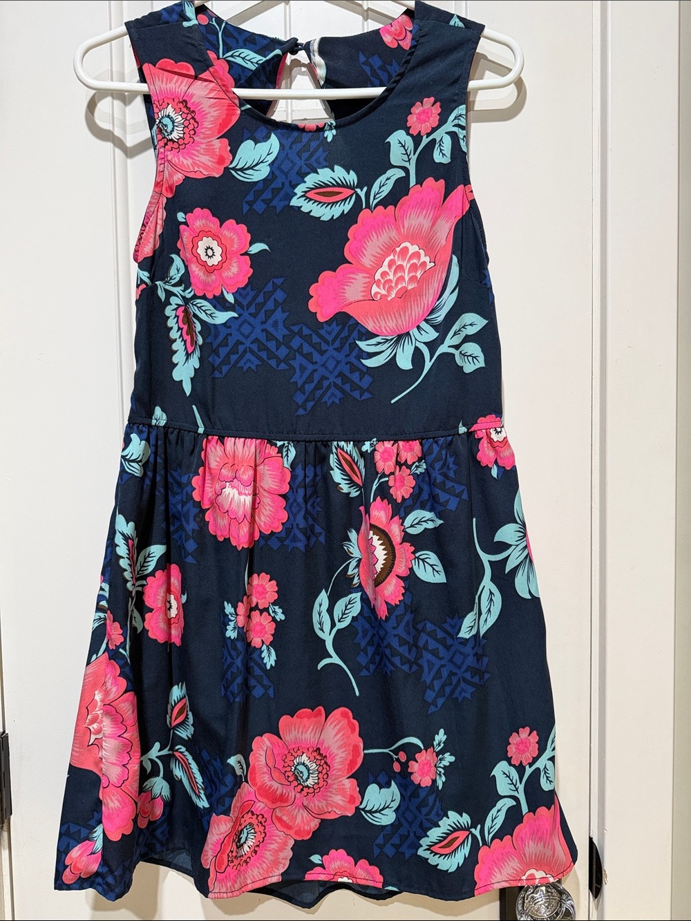 Women’s size Small floral mini dress. Cut out back